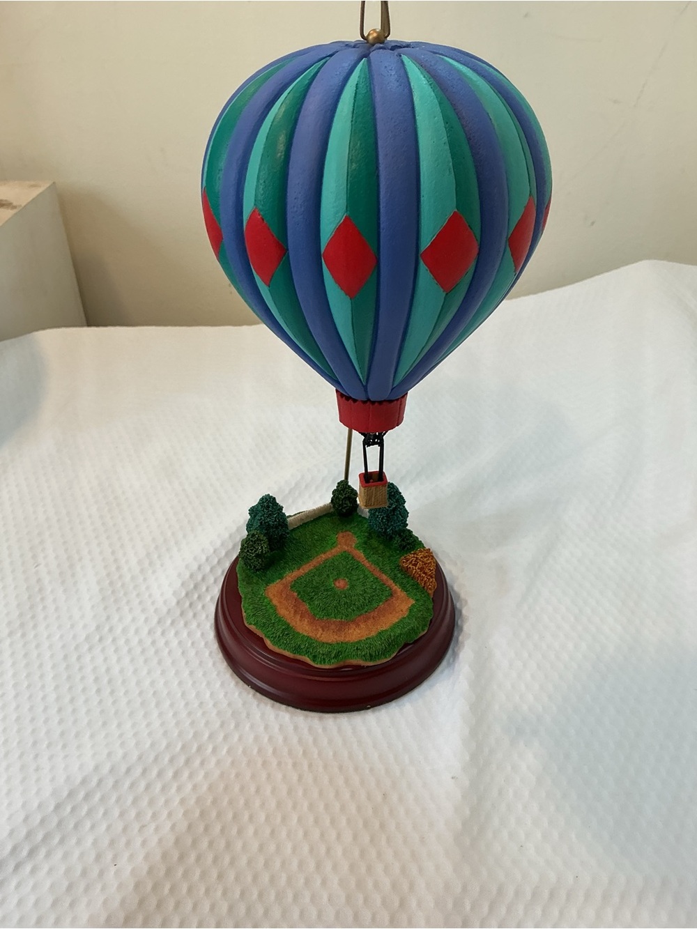Decorative Blue & Teal Hot Air Balloon Figurine with Red Accents